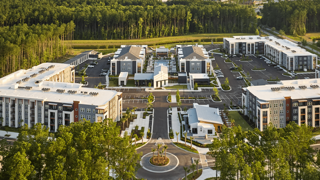 Aerial view of The Ames apartment complex and parking